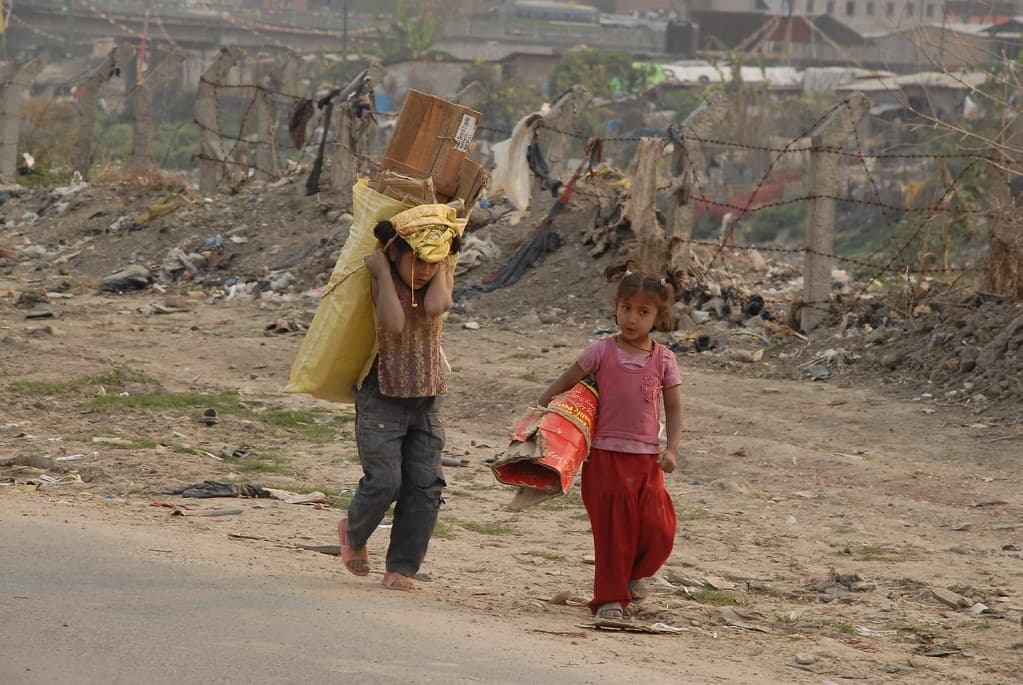 Children working in difficult conditions to support their daily needs